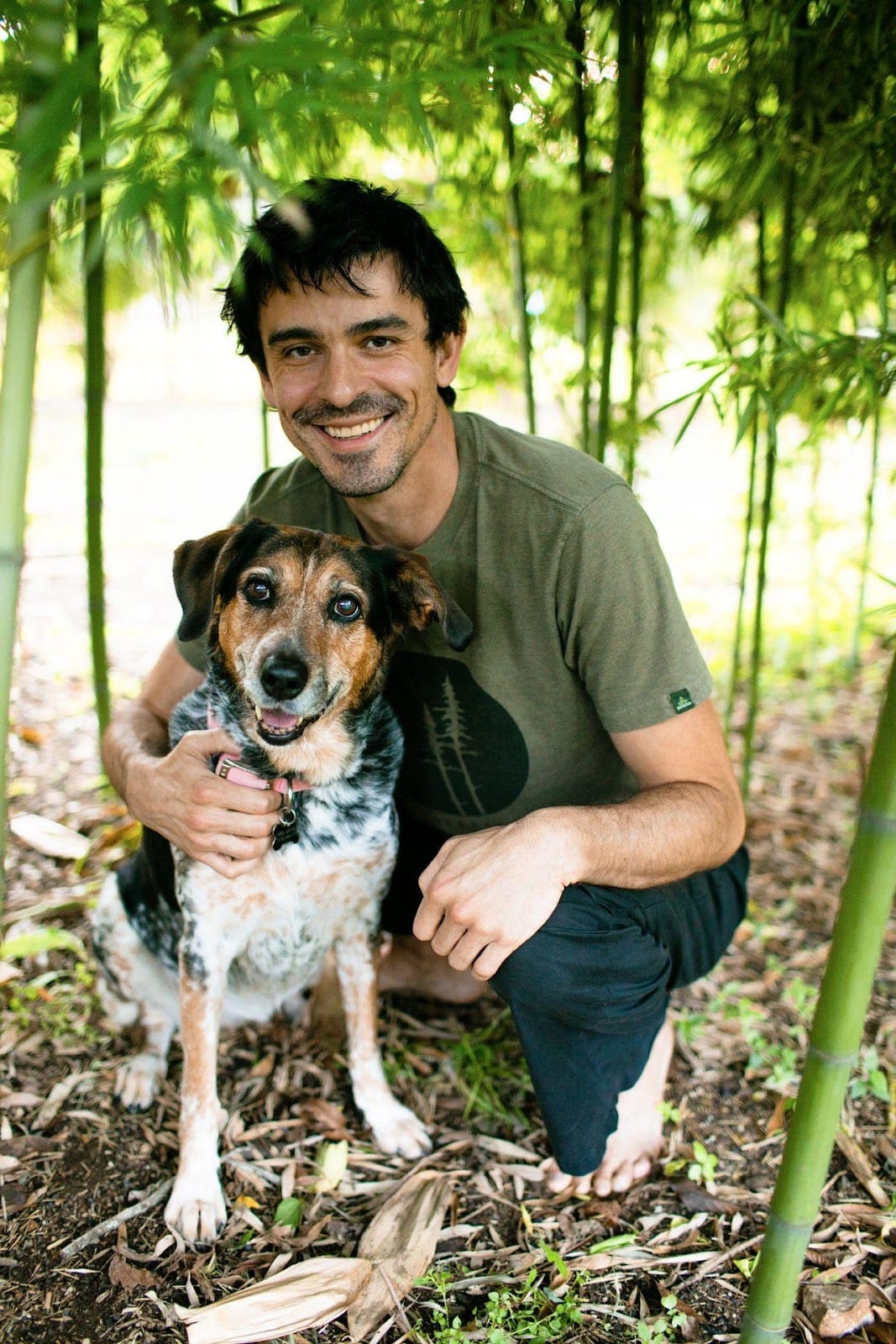 Daniel Plastino outdoors with his dog